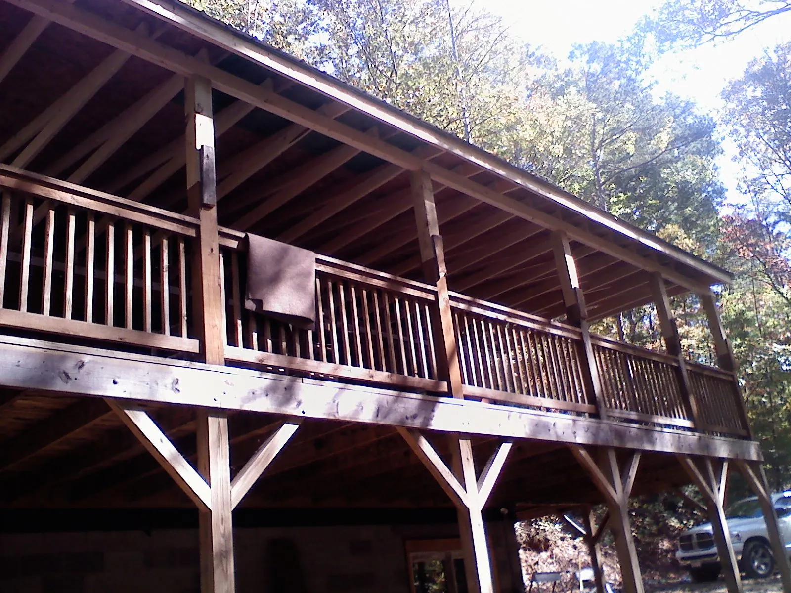 Timber framing under a new elevated porch and deck — Roof Leak Repair in Lumpkin by Roofing Brothers